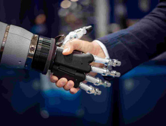 hand of a businessman shaking hands with a android 2022 02 02 03 49 01 utc