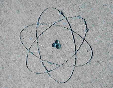 atomic simbol on concrete floor knowledge concep 2024 12 08 00 46 56 utc re