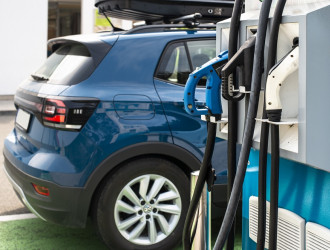 electric car on gas station blue car and electric 2024 10 14 11 00 06 utc