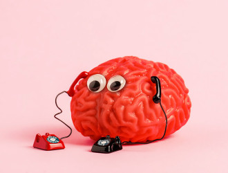 human brain model with two retro phones on pink ba 2023 11 27 05 33 55 utc 2