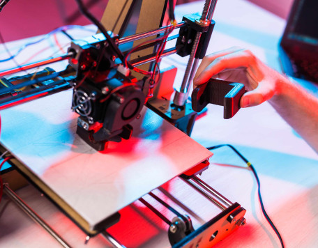 man student makes the item on the 3d printer 2025 02 25 19 55 12 utc 1